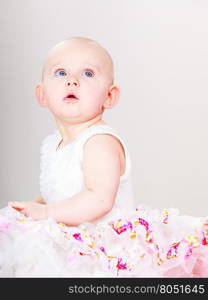 Little girl child portrait. Lovely little child girl in princess fairy dress. Portrait of cute beauty sweet baby ballerina.