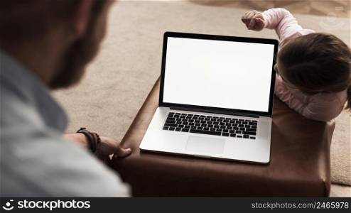 little girl dad spending time together laptop