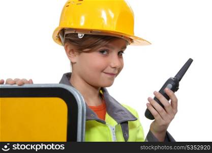 little girl disguised as site foreman
