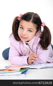 Little girl doing schoolwork