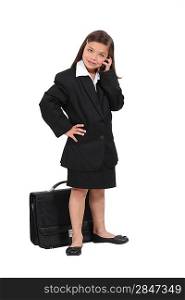 little girl dressed as a businesswoman