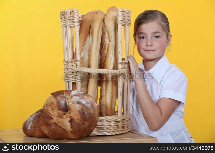 Little girl dressed as bakery worker