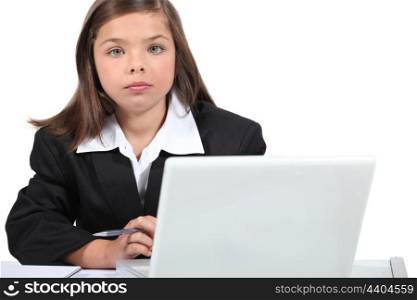 Little girl dressed as business worker