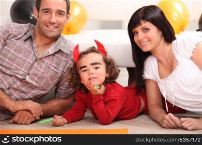 Little girl dressed as devil