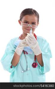 Little girl dressed up in nurses costume
