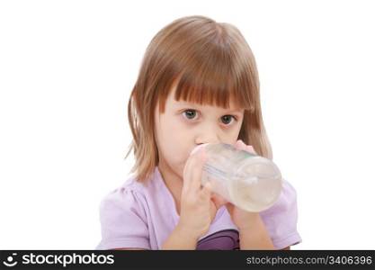 Little girl drinking water of her bottle. White background