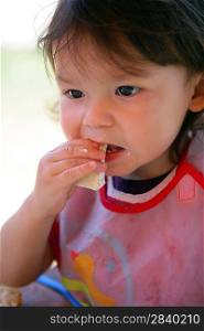 Little girl eating her lunch