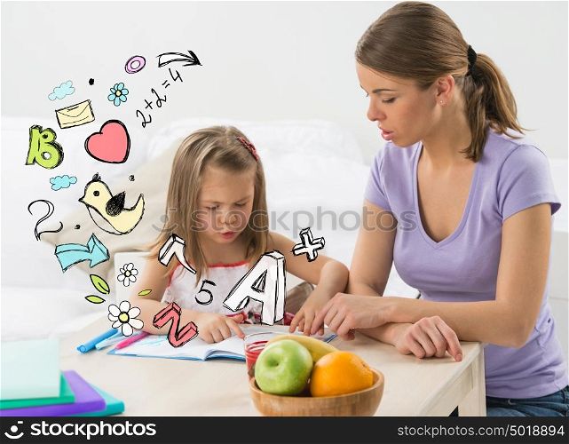 Little girl educating at home with her mother symbols drawn over her head