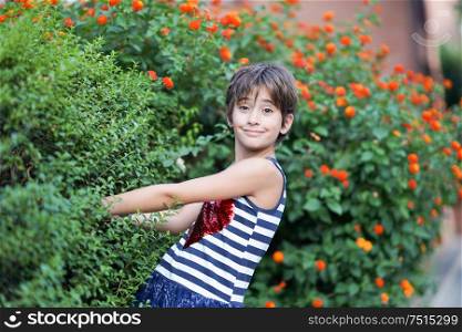 Little girl, eight years old, having fun in an urban park.. Little girl, eight years old, having fun outdoors.