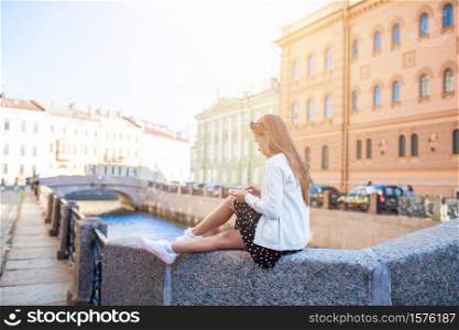 Little girl enjoy vacation in Saint Petersburg. Cute little girl in Saint Petersburg in Russia