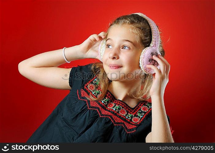 little girl enjoying music