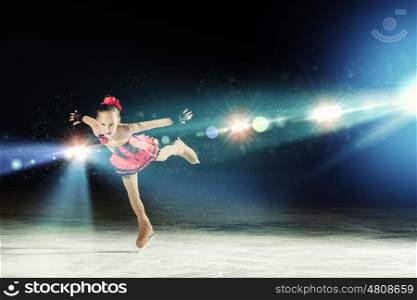 Little girl figure skating. Little girl figure skating at sports arena
