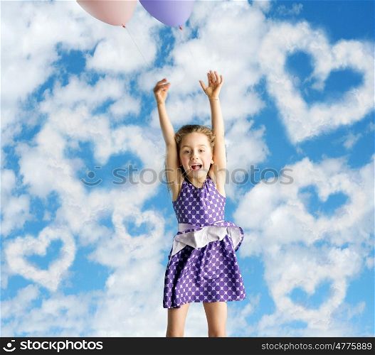 Little girl flying up to the sky