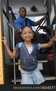 Little Girl Getting off of Schoolbus