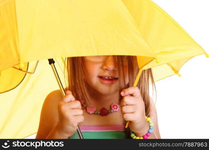 Little Girl glasses standing with yellow umbrella