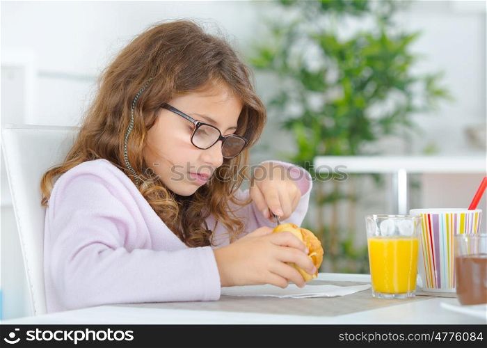 Little girl having a drink