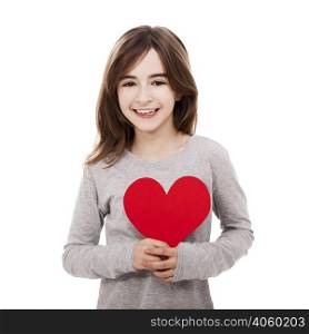 Little girl holding a heart made with paper , isolated over a white background