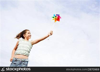 Little Girl Holding a Pinwheel