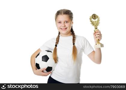 Little girl holding football ball and trophy isolated on white