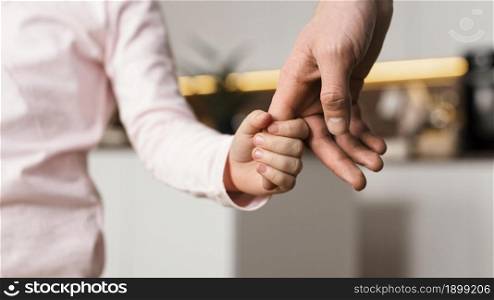little girl holding hands with father. Resolution and high quality beautiful photo. little girl holding hands with father. High quality beautiful photo concept