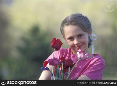 Little Girl Holding Tulips