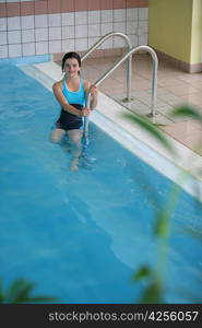 Little girl in a swimming pool