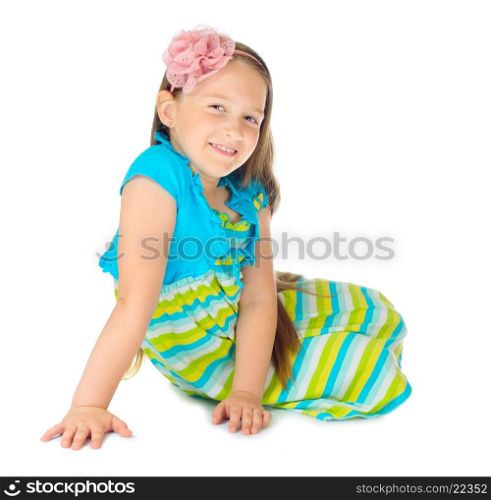 Little girl in blue dress isolated