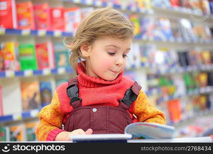 Little girl in bookshop