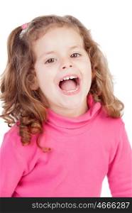 Little girl in pink laughing out loud isolated on a white background