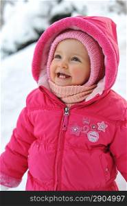 little girl in red jacket in winter