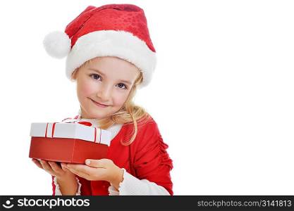 little girl in red santa cap holding christmas present
