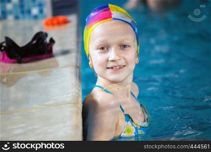little girl in the pool at workout
