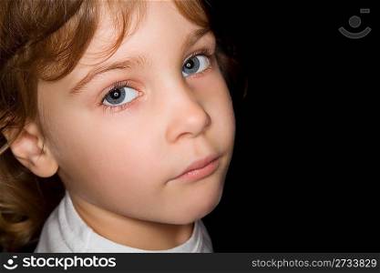 little girl in white T-shirts isolated on black background