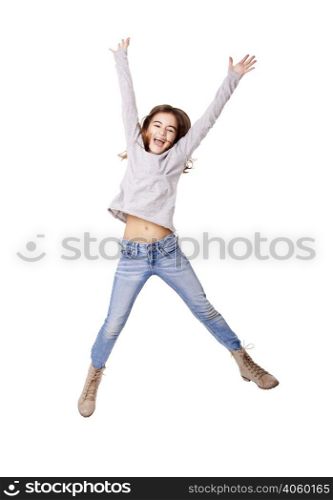 Little girl jumping over a white background