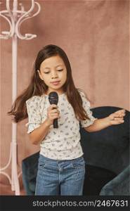 little girl learning how sing home 2