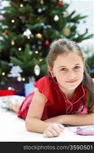 Little Girl Listening to CD Player