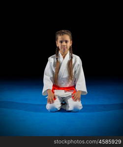 Little girl martial arts fighter isolated