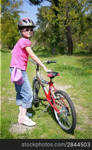 Little girl on a bike ride