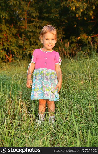 little girl on grass