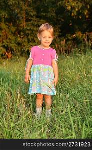 little girl on grass