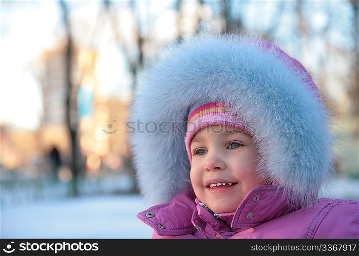 little girl onstreet in winter