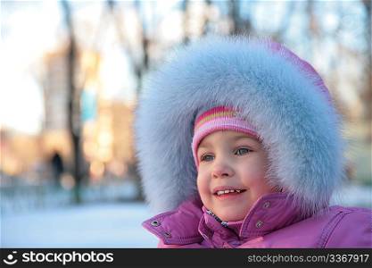 little girl onstreet in winter