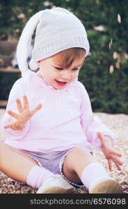 Little girl playing at the park