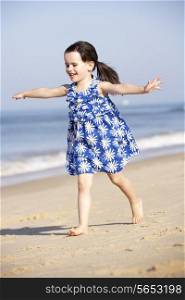 Little Girl Running Along Beach