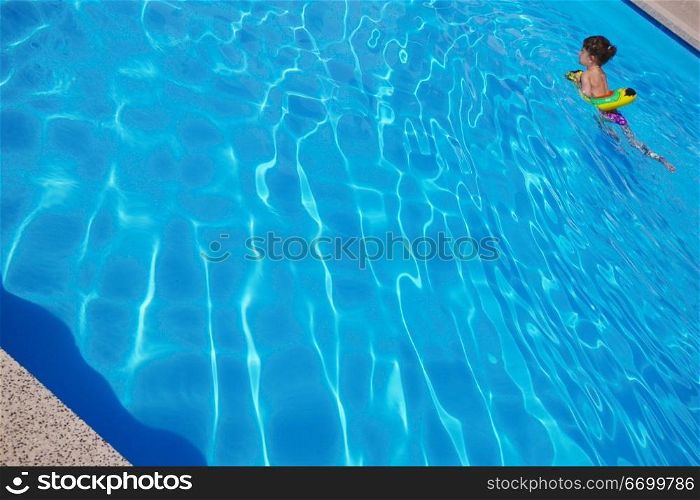 Little Girl Swimming In Pool