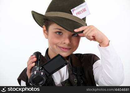 little girl taking a photo