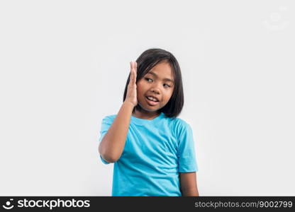 Little girl thinking in studio shot