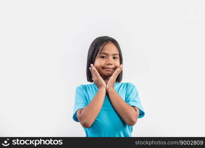 Little girl thinking in studio shot