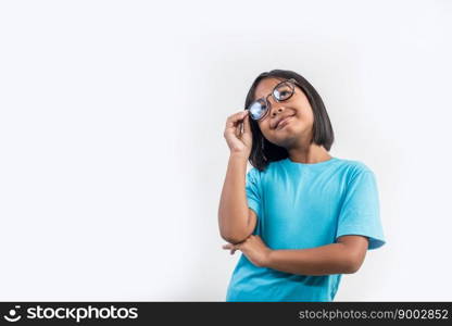 Little girl thinking in studio shot