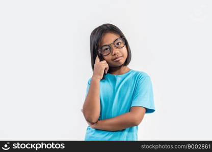 Little girl thinking in studio shot